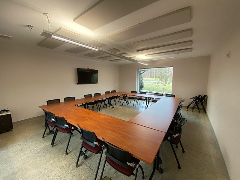 Room with tables arranged in a square