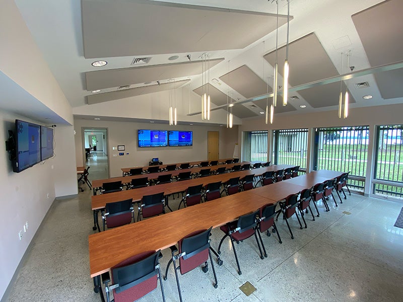 Large room with tables arranged in rows