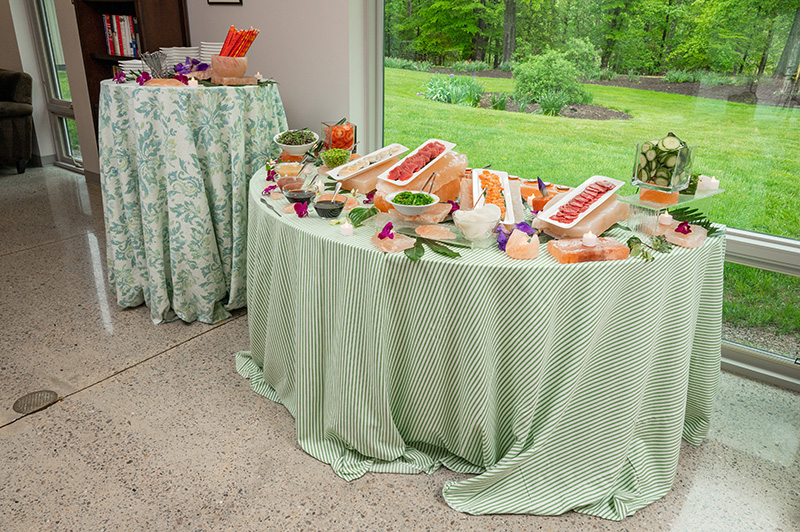 Table with a spread of food for event guests.